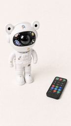 AstroGlow astronaut galaxy projector with its remote control